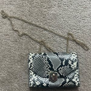 Banana Republic cross body snakeskin clutch with goal chain and gold clasp close